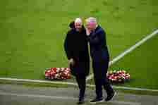 Manager Erik ten Hag of Manchester united and Manager David Moyes of West Ham United lay a wreath of flowers to pay a tribute for the 66th annivers...