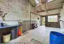 The house has a garage with 'potential for various uses', according to the listing