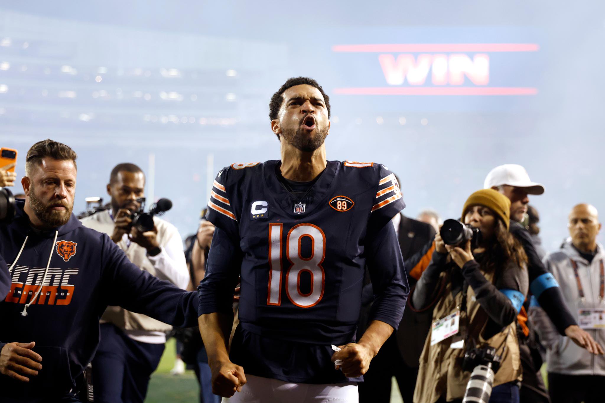 Chicago Bears' Caleb Williams celebrates after defeating the New England Patriots.