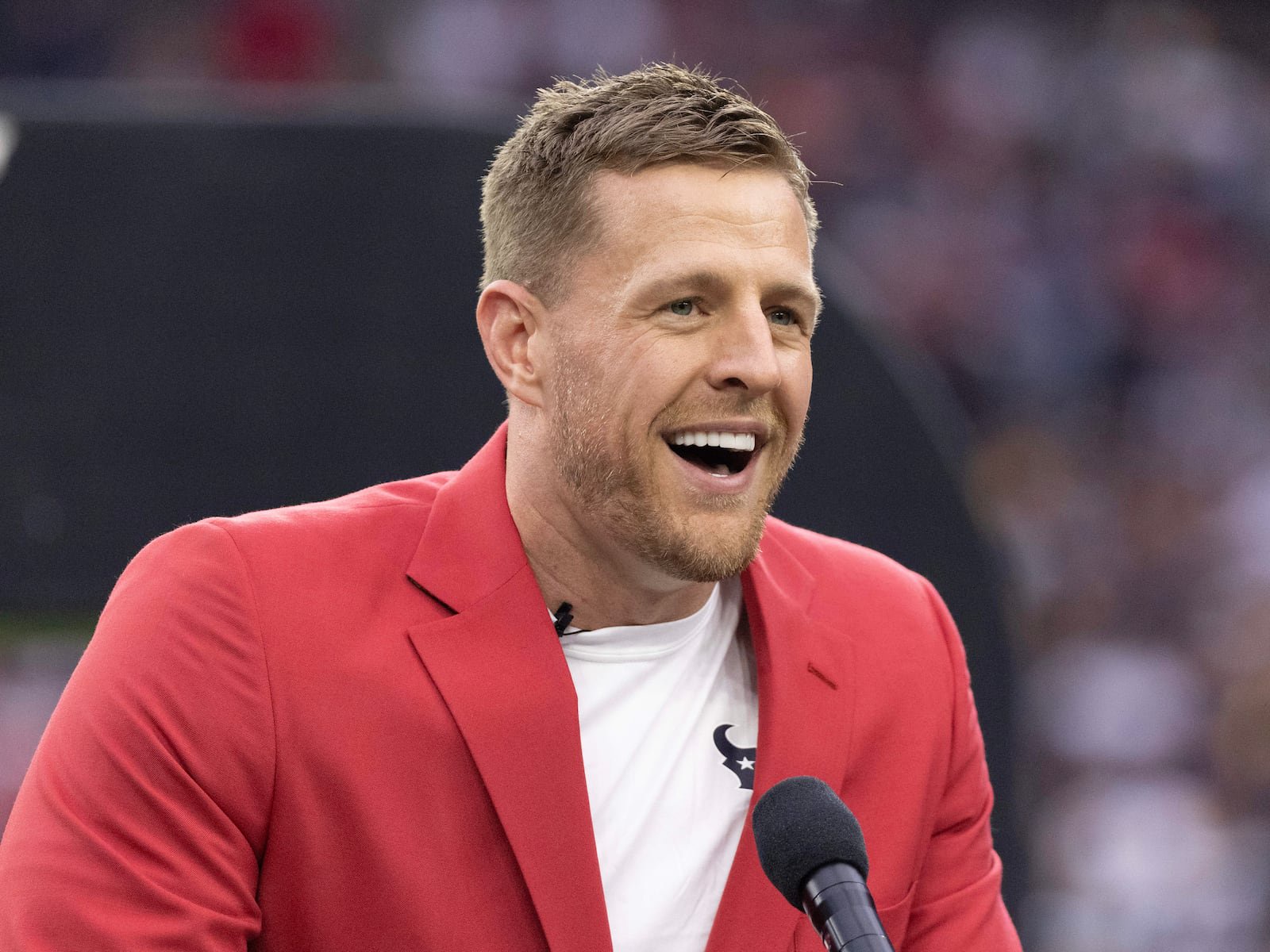 Oct 1, 2023; Houston, Texas, USA; Former Houston Texans JJ Watt speaks to the fans during his Ring Of Honor Ceremony at halftime during the game between the Texans and Pittsburgh Steelers at NRG Stadium. Mandatory Credit: Thomas Shea-USA TODAY Sports