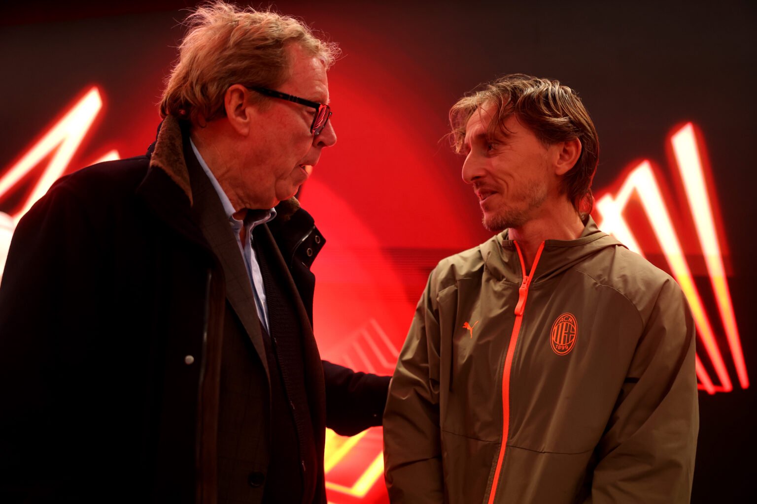 Harry Redknapp interacts with Luka Modric