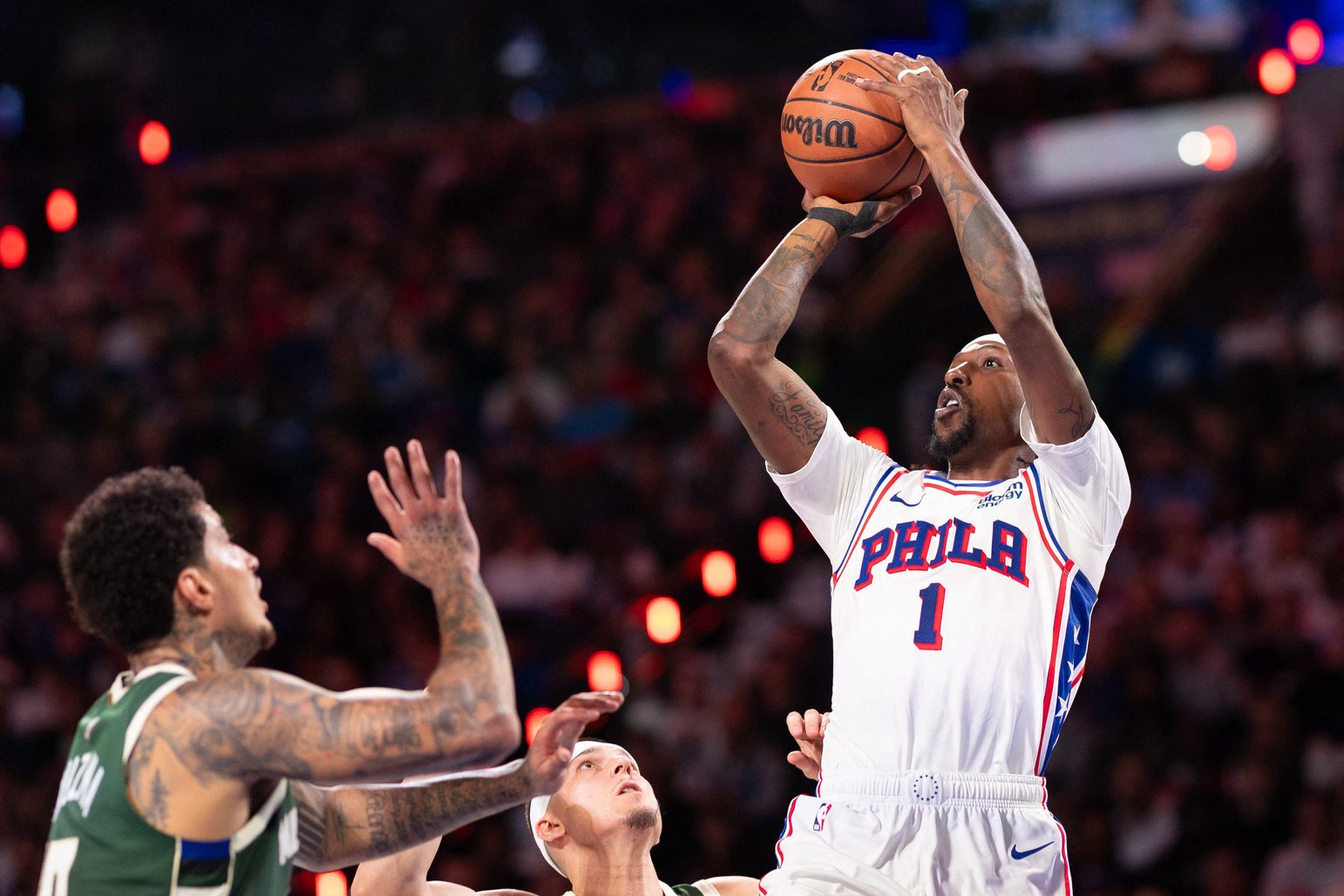 Oct 24, 2026; Philadelphia, Pennsylvania, USA; Philadelphia 76ers guard Kentavious Caldwell-Pope (1) shoots against the Milwaukee Bucks during the second quarter at Xfinity Mobile Arena. Mandatory Credit: Bill Streicher-Imagn Images