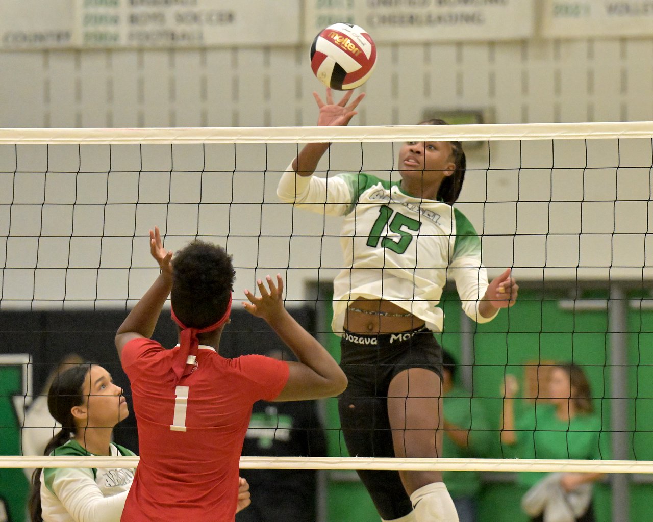 Arundel Wildcats Imani Monroe #15 scores on a light hit over the net in the second set. The Arundel Wildcats defeated the visiting Crofton Cardinals in three sets in their high school volleyball match Tuesday evening. (Paul W. Gillespie/Staff)