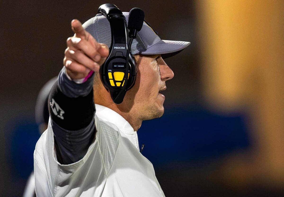 Southridge head football coach Matt Johnson directs his team from the sideline during the Suns' game against Kennewick on Thursday at Neil F. Lampson Stadium in Kennewick. Johnson, in his fifth season as head coach, led Southridge to its first Mid-Columbia Conference football championship since 2008.