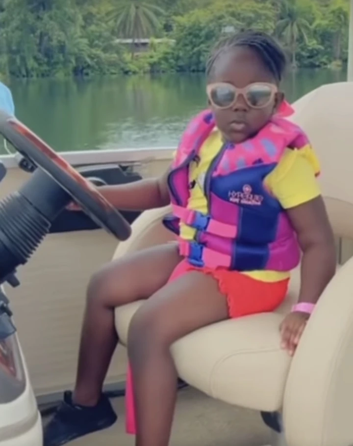 Beautiful video of Stonebwoy's daughter driving her mum and dad as they cruise on a boat