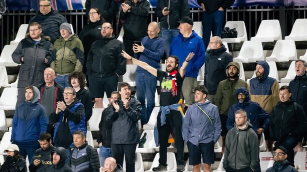 COMO, ITALY - OCTOBER 21: Manchester United fans watch from the stands during the UEFA Champions League 2026/27 League Phase MD3 match between Como 1907 and Manchester United at Giuseppe Sinigaglia Stadium on October 21, 2026 in Como, Italy. (Photo by Ash Donelon/Manchester United via Getty Images)