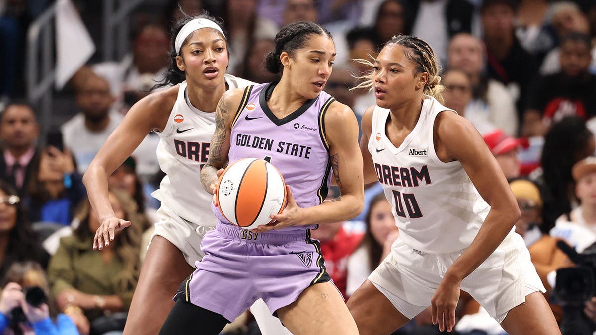 Gabby Williams of the Golden State Valkyries looks to shoot against Naz Hillmon of the Atlanta Dream.