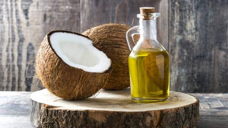 Coconut oil: It is a natural emollient and has antibacterial and antifungal properties. Massaging it into your heels can deeply moisturise the skin, create a protective barrier, and help prevent infections (Image: Canva)