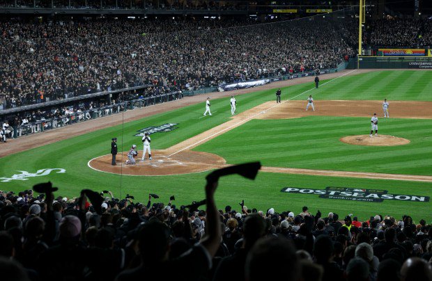White Sox fans cheer while their team loads the bases against the Cleveland Guardians in the third inning in Game 4 of their AL Division Series game on Oct. 8, 2026, at Rate Field in Chicago. (Brian Cassella/Chicago Tribune)
