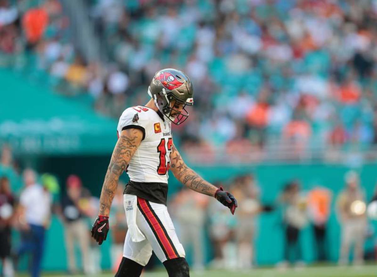 Dec 28, 2025; Miami Gardens, Florida, USA; Tampa Bay Buccaneers wide receiver Mike Evans (13) walks on the field during the fourth quarter against the Miami Dolphins at Hard Rock Stadium. © Imagn