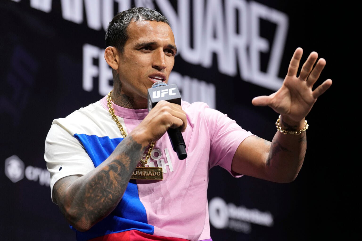 Charles Oliveira is seen on stage during a Q&A session prior to the UFC 312 ceremonial weigh-in