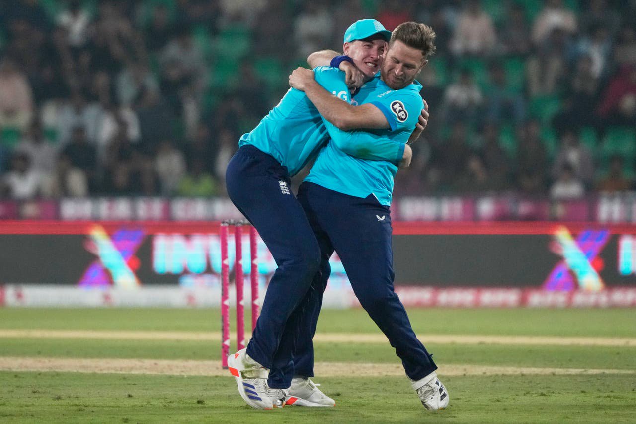 Liam Dawson, right, and Harry Brook celebrate the wicket of Salman Ali Agha