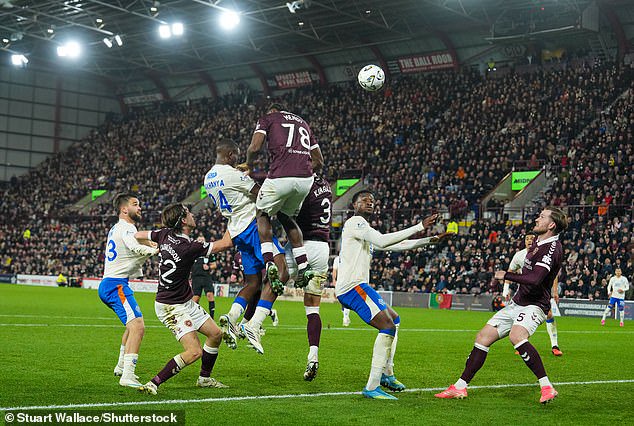 The impressive Makhanya headed a late equaliser at Tynecastle as Rangers rescued a point