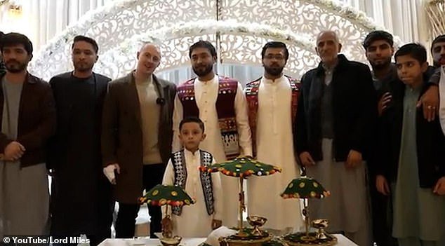 The Youtuber was seen enjoying food and drink at the packed out wedding