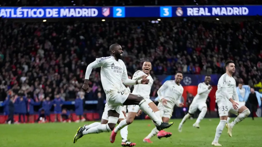 Real madrid players celebrate after winning the penalty shootout during the champions league round of second leg at metropoli