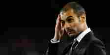 Pep Guardiola scratching his head as Barcelona manager in 2009