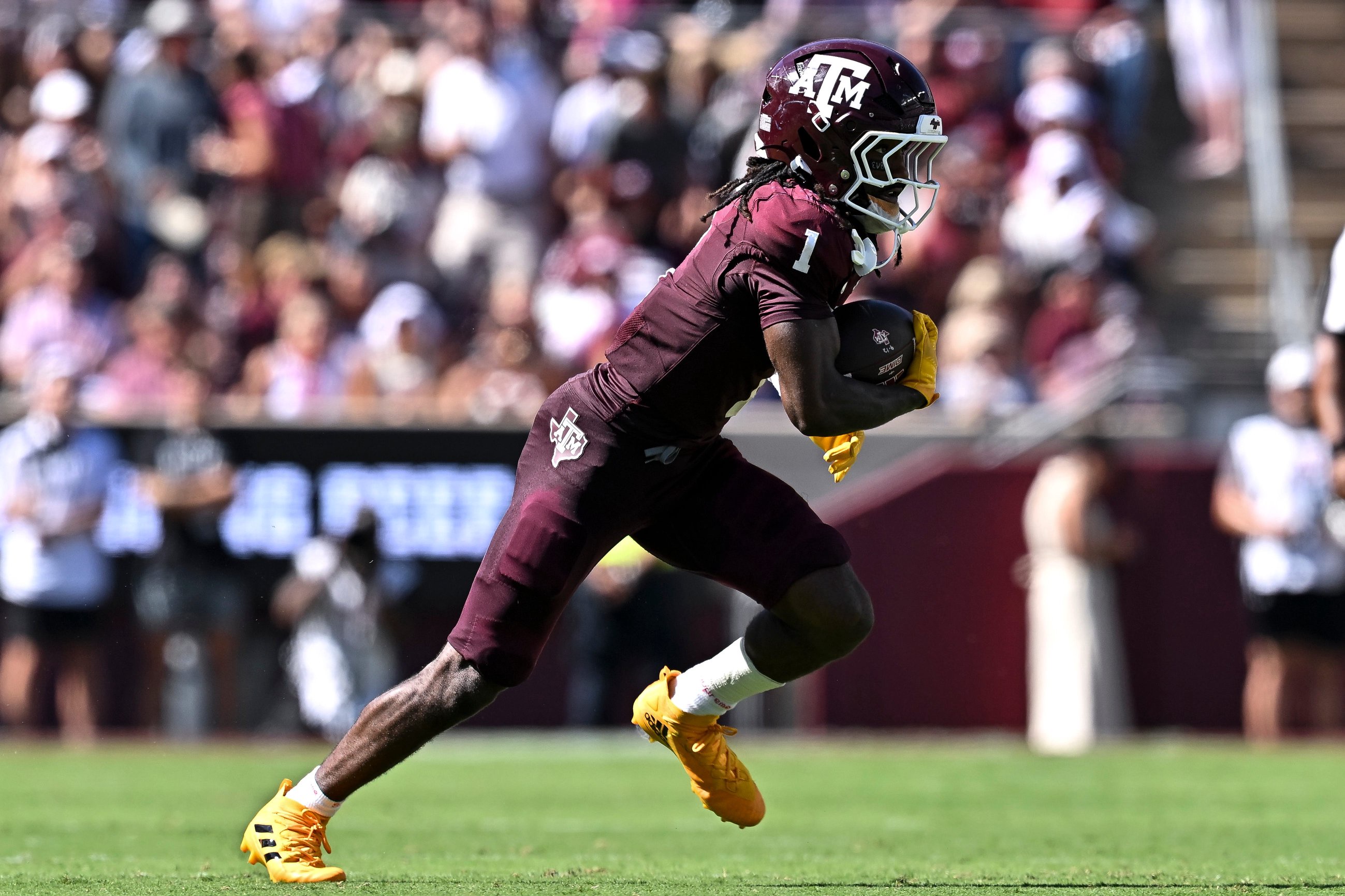 Sep 19, 2026; College Station, Texas, USA;  Texas A&amp;M Aggies wide receiver Mario Craver (1) runs the ball during the first half against the Kentucky Wildcats at Kyle Field. Mandatory Credit: Maria Lysaker-Imagn Images