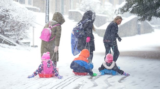 Children are removed on sledges in Buxton