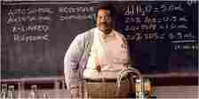The Nutty Professor Eddie Murphy as Sherman Klump in front of a chalkboard with equations