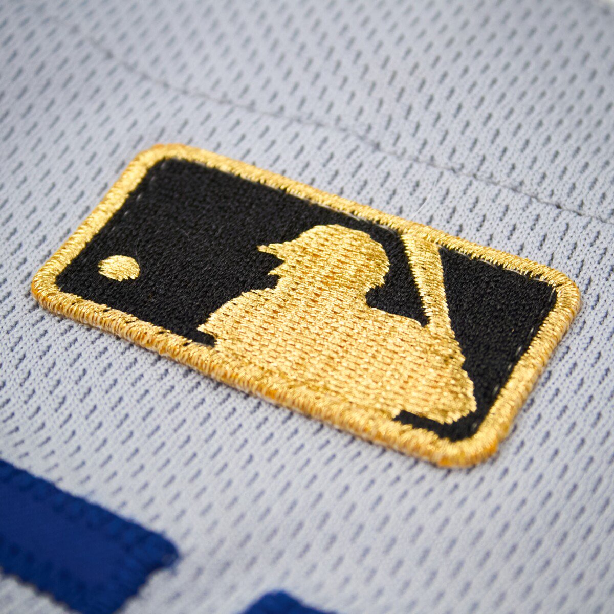 The gold MLB logoman patch from Shohei Ohtani's Tokyo Series jersey