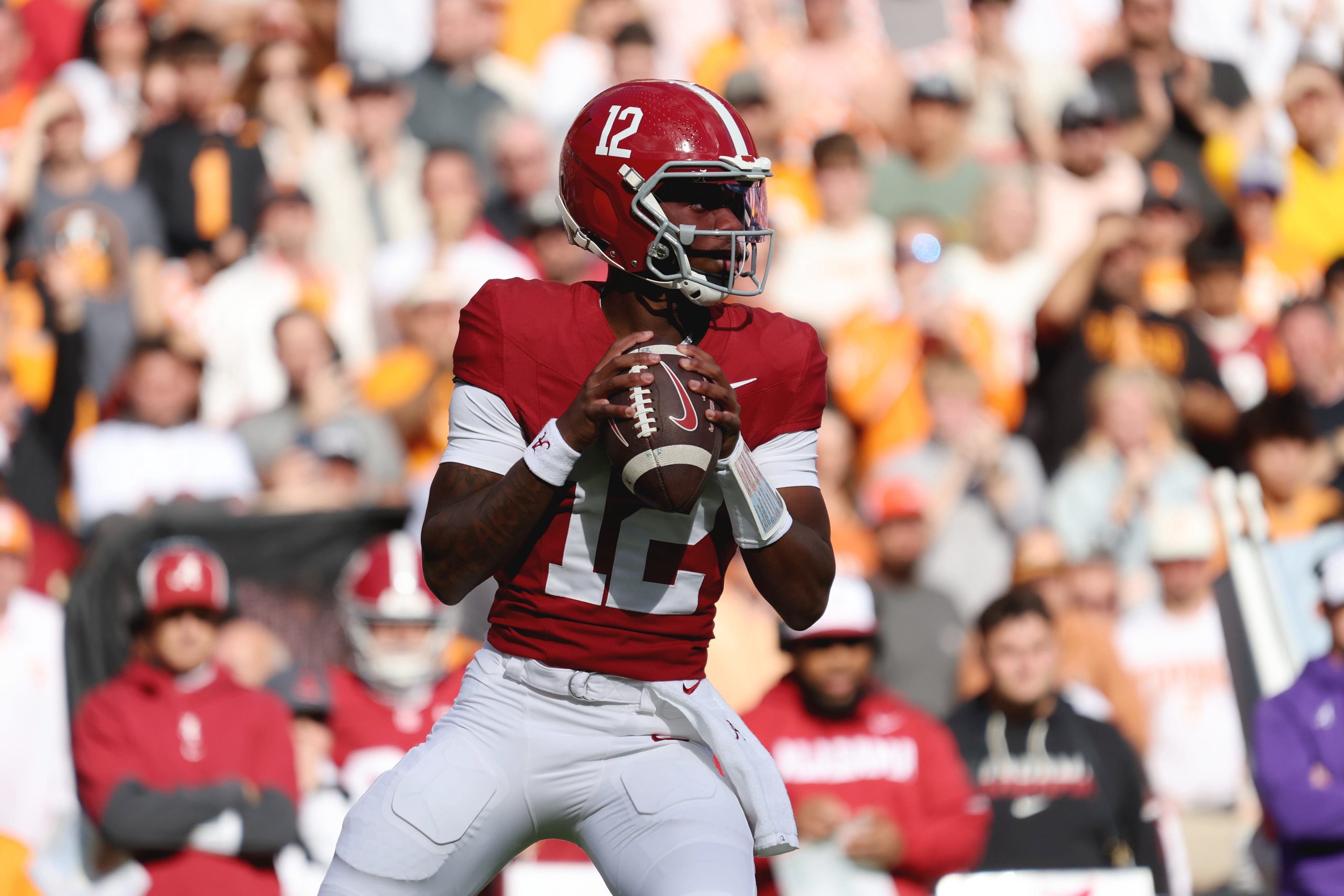 Oct 17, 2026; Knoxville, Tennessee, USA;  Alabama Crimson Tide quarterback Keelon Russell (12) looks to pass against the Tennessee Volunteers during the first half at Neyland Stadium.  Mandatory Credit: Randy Sartin-Imagn Images