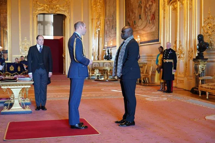 Prince William handed the OBE medal to Muyiwa at the event on the 12th of January 2022.