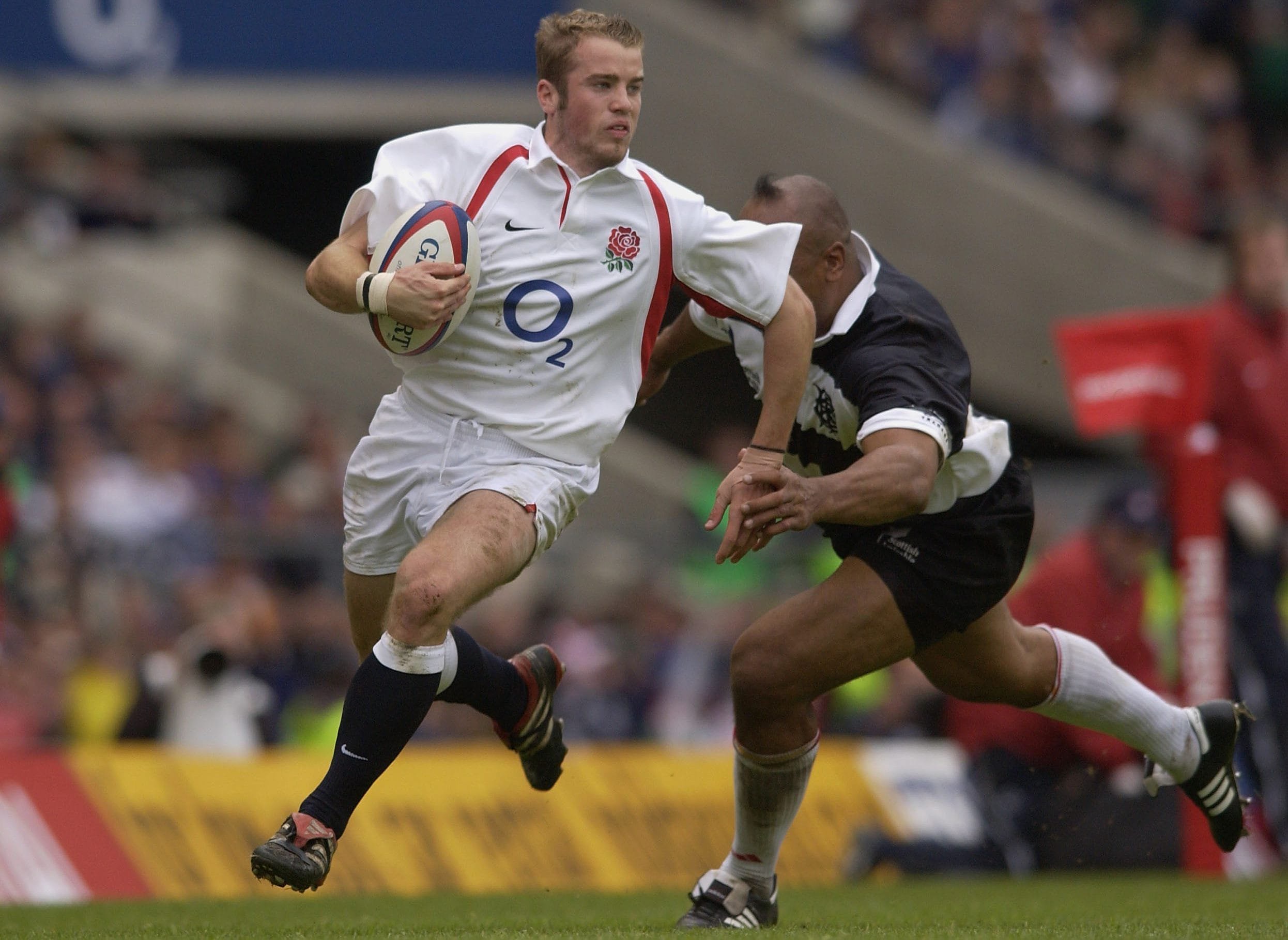 James Simpson-Daniel evades Jonah Lomu