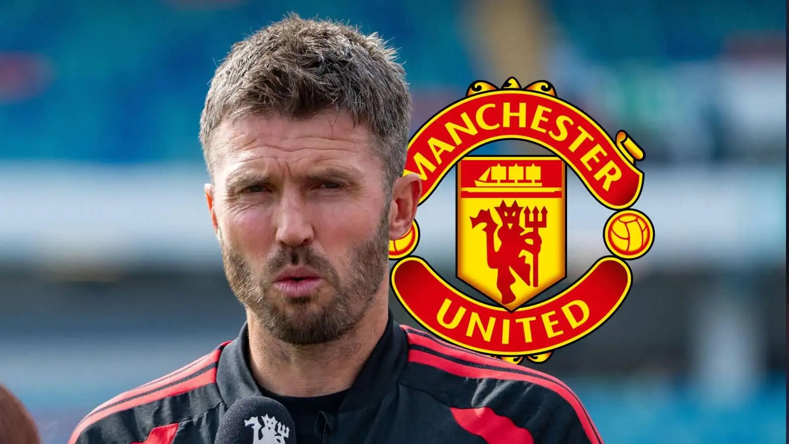 Manchester United boss Michael Carrick next to the club badge - copyright TEAMtalk