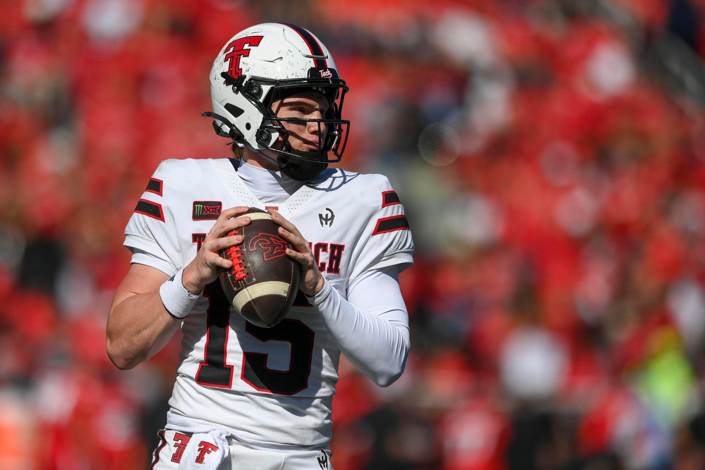 CINCINNATI, OHIO - OCTOBER 24: Will Hammond #15 of the Texas Tech Red Raiders warms up during a timeout during the first half of a game against the Cincinnati Bearcats at Nippert Stadium on October 24, 2026 in Cincinnati, Ohio. (Photo by Tanner Pearson/Getty Images)