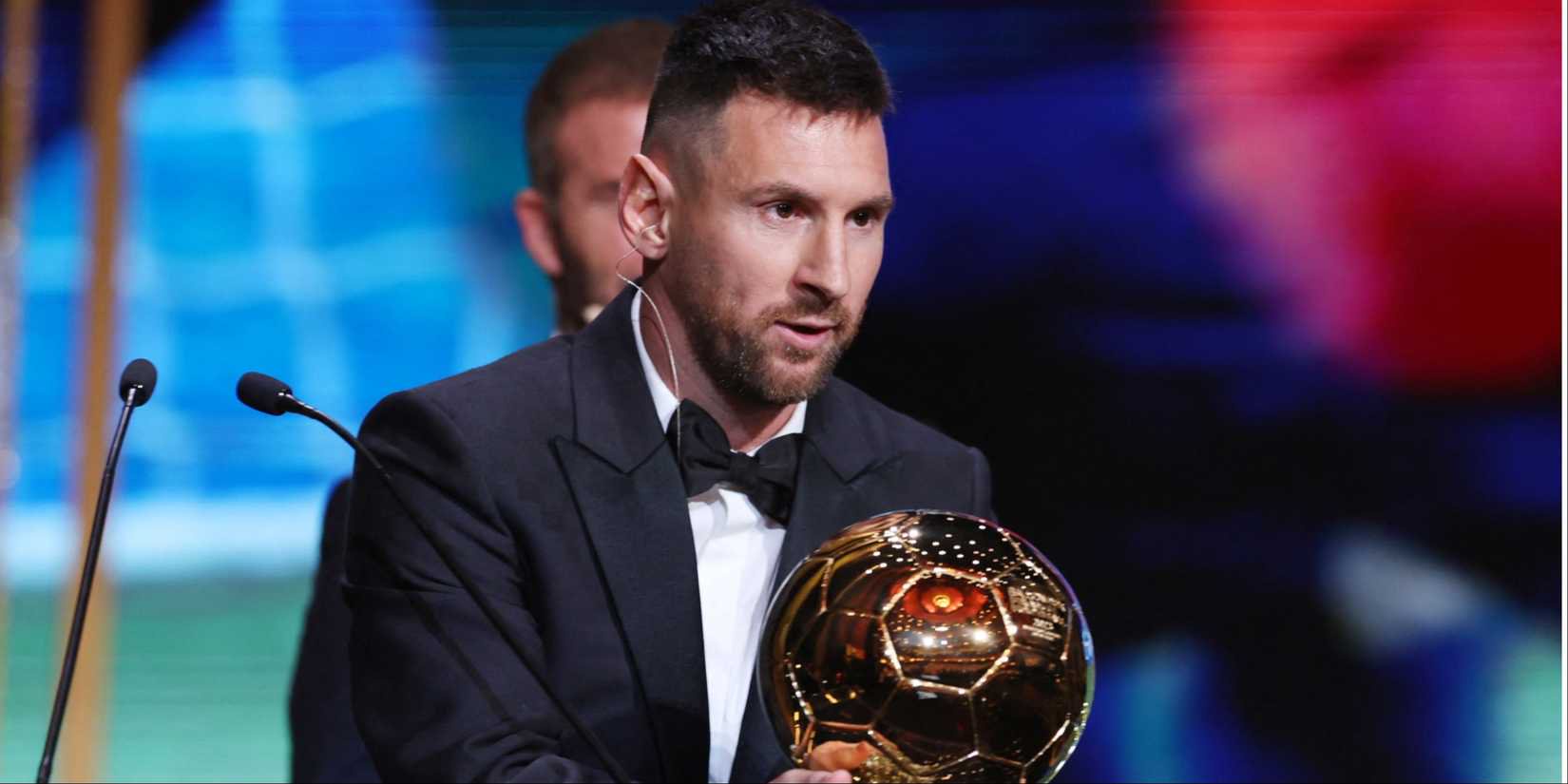 Lionel Messi with the Ballon d'Or