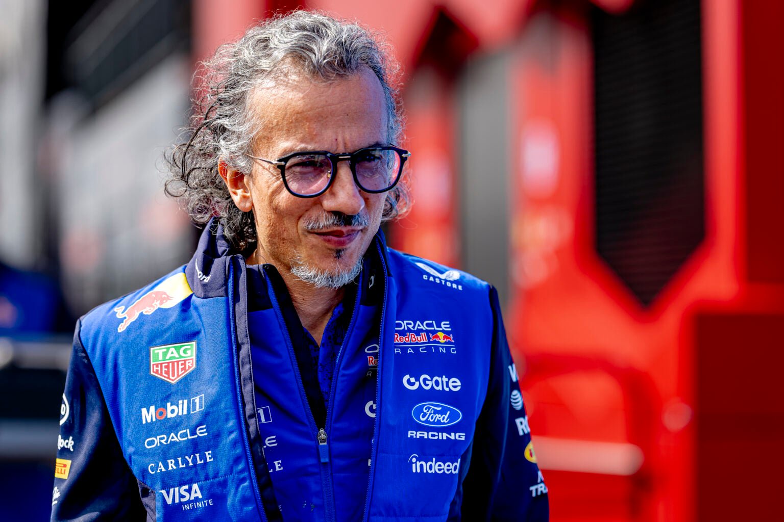 Laurent Mekies of Red Bull smiles in the F1 paddock