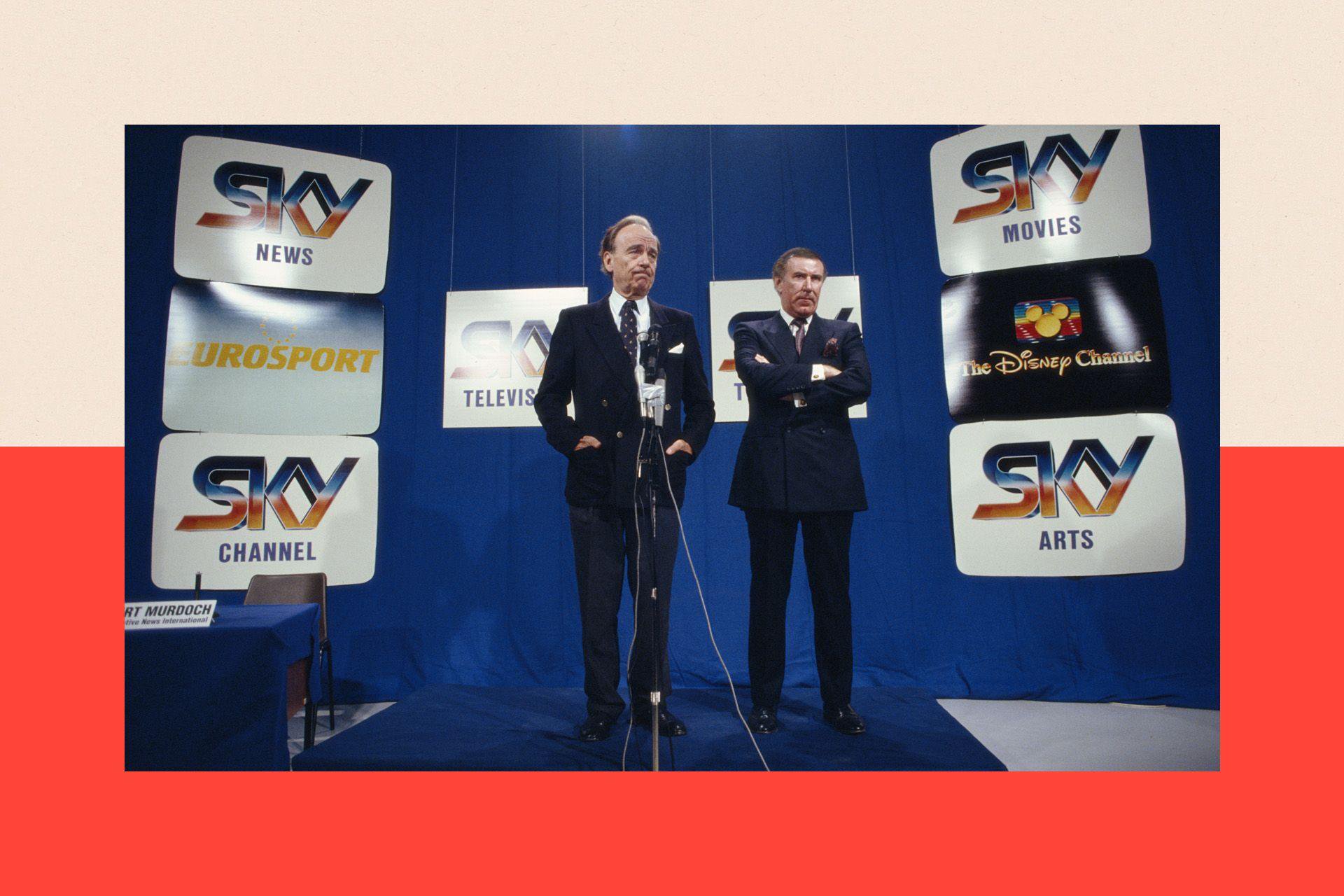 Media magnate Rupert Murdoch and broadcaster Andrew Neil at the launch of Sky TV in London, 5th February 1989
