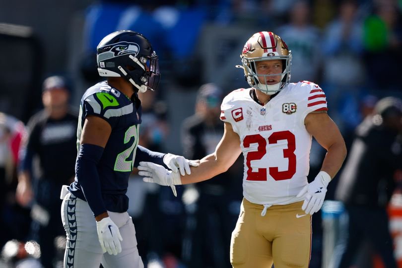 Christian McCaffrey reacts against Julian Love