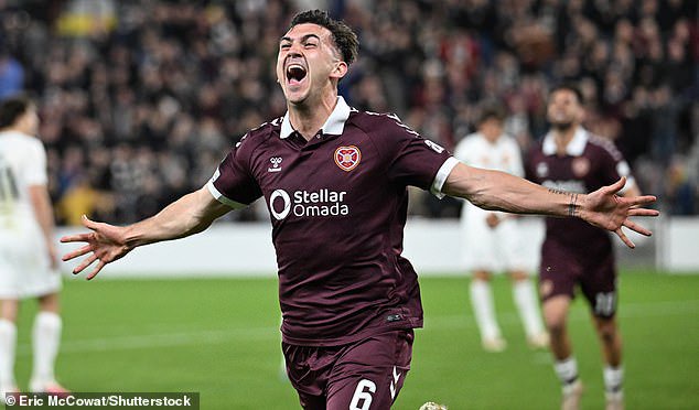 Oisin McEntee celebrates after giving Hearts the lead against Nordsjaelland