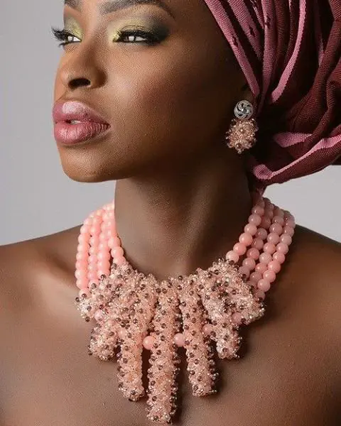  woman with Jewelry around her neck