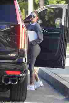 Jennifer Lopez shows off her famous derriere in skintight leggings