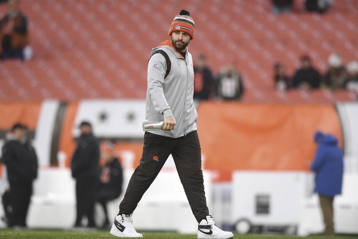 FILE - Cleveland Browns quarterback Baker Mayfield walks on the field before an NFL football game against the Cincinnati Bengals, on, Jan. 9, 2022, in Cleveland. Mayfield's rocky run with Cleveland officially ended Wednesday, July 6, 2022, with the Browns trading the divisive quarterback and former No. 1 overall draft pick to the Carolina Panthers, a person familiar with the deal told the Associated Press. (AP Photo/Nick Cammett, File)