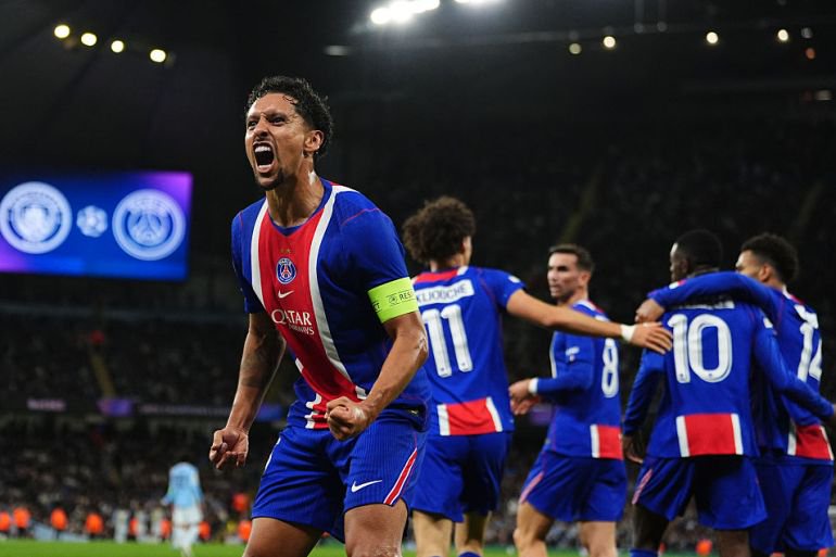 Paris Saint-Germain's Marquinhos celebrates after team-mate Maghnes Akliouche scores their side's fourth goal of the game during the UEFA Champions League, league phase match at the Etihad Stadium, Manchester City
