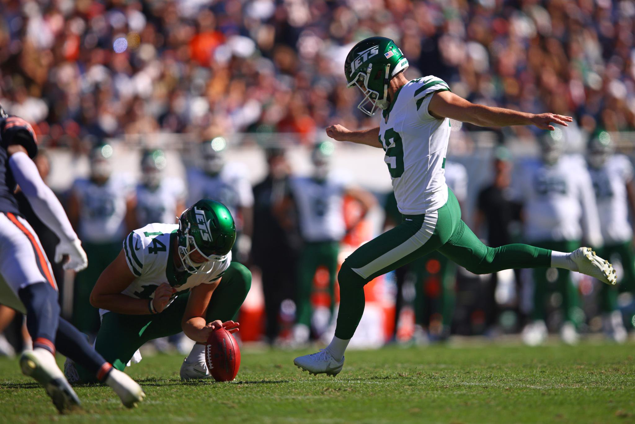 New York Jets kicker Jason Sanders kicks a field goal during a game against the Chicago Bears.