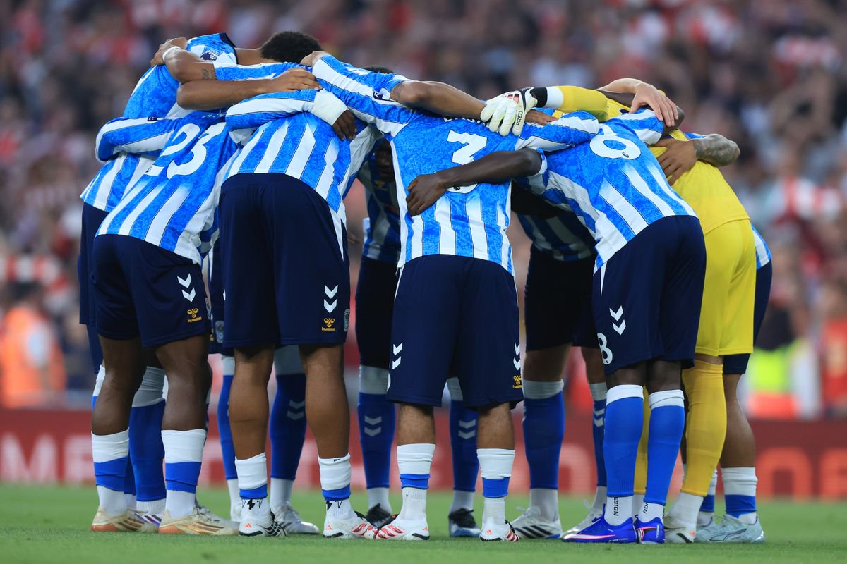 Coventry City team huddle before the Premier League 2026/27 match between Arsenal FC and Coventry City at Emirates Stadium on August 21, 2026 in London, England