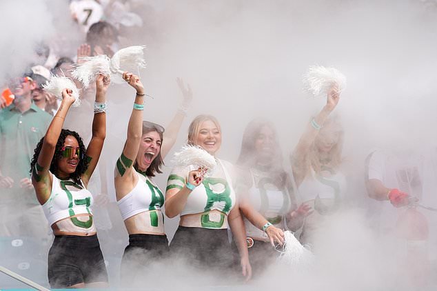 Miami fans cheer during the first half of an NCAA college football game against Pittsburgh, Saturday, Oct. 24, 2026, in Miami Gardens, Fla. (AP Photo/Rebecca Blackwell)