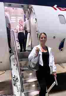 'Crazy plane lady¿ Tiffany Gomas has celebrated the one year anniversary of her meltdown onboard an American Airlines flight by getting on another plane