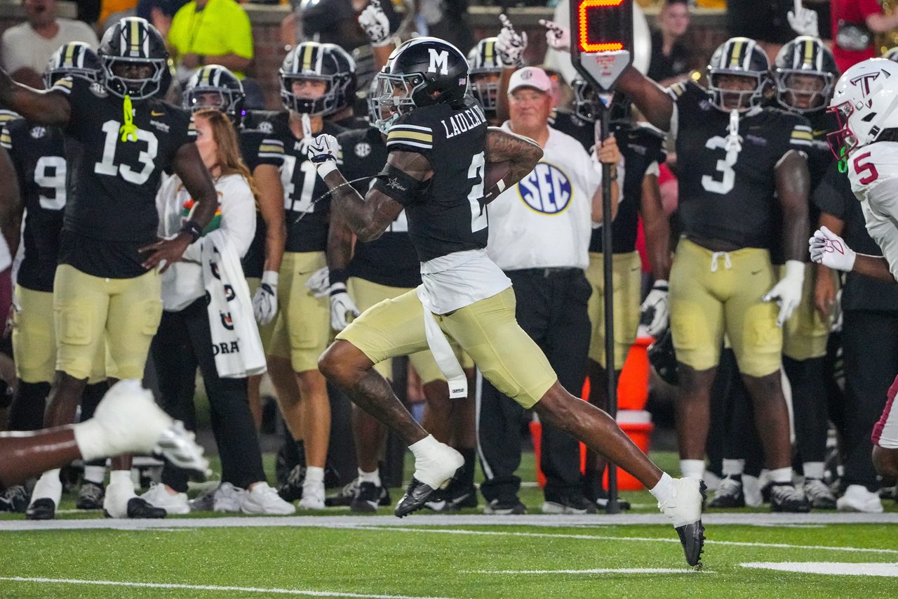 Sep 19, 2026; Columbia, Missouri, USA; Missouri Tigers cornerback Sione Laulea (2) runs for a touchdown after intercepting a pass from the Troy Trojans during the first half of the game at Faurot Field at Memorial Stadium. Mandatory Credit: Denny Medley-Imagn Images