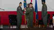 Col. James Ord 552nd, accepts command of the 552nd Training Group from Col. Kenneth Voigt 552nd, Air Control Wing commander, during a change of command ceremony