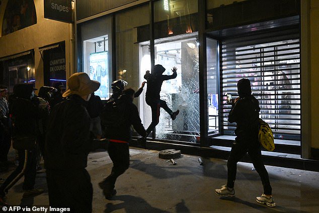 In France's worst civil unrest in years, rioters clashed with police and set cars on fire