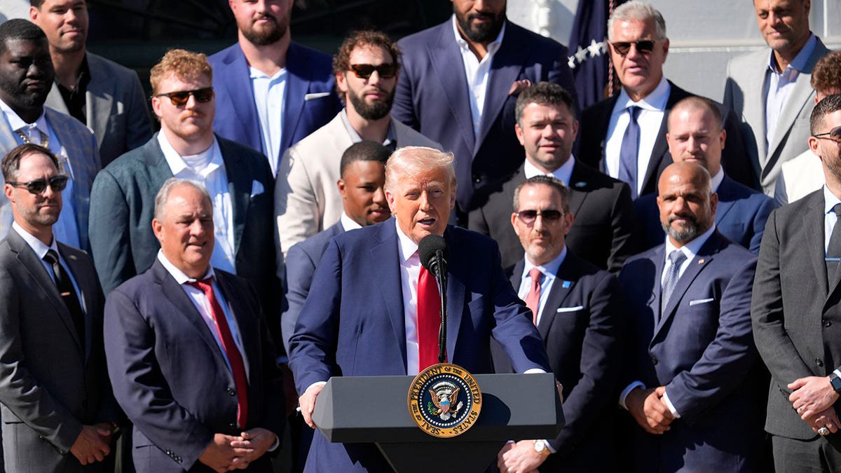 Donald Trump with Eagles in background