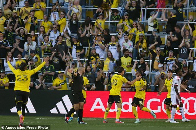 Columbus Crew players celebrate their goal against Toronto FC during the first half of an MLS soccer match, Saturday, Oct. 24, 2026, in Columbus, Ohio. (AP Photo/Jay LaPrete)