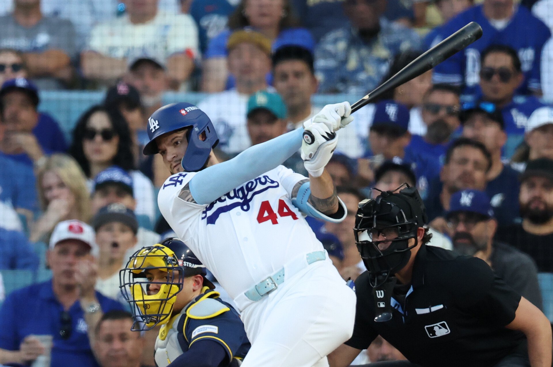 Oct 15, 2026; Los Angeles, California, USA; Los Angeles Dodgers outfielder Andy Pages (44) hits a RBI single during the second inning against the Milwaukee Brewers in game four of the NLCS for the 2026 MLB Playoffs at Uniqlo Field at Dodger Stadium. Mandatory Credit: Kiyoshi Mio-Imagn Images
