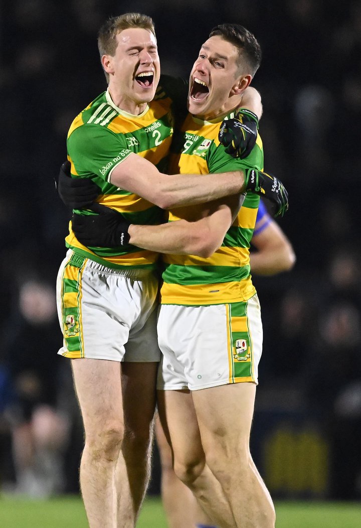 Edendork players Donal Maneely and Harry Og Conlan celebrate after their Tyrone SFC Final replay win over Errigal Ciaran.