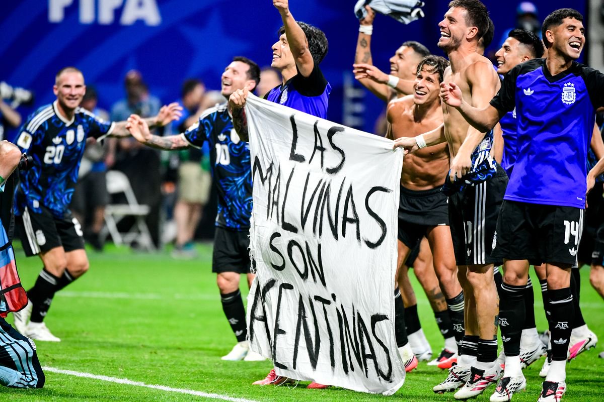 ATLANTA, GEORGIA - JULY 15: Players of Argentina hold a banner after the FIFA World Cup 2026 Semi Final match between England and Argentina at Atlanta Stadium on July 15, 2026 in Atlanta, Georgia. The banner refers to the British Overseas Territory of the Falkland Islands, located off the coast of Argentina. Argentina disputes British sovereignty over the islands and refers to them as Las Malvinas. (Photo by MB Media/Getty Images)
